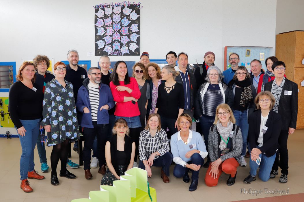 Group photo with fellow artists at Salon du Livre Jeunesse 2023 de St Gervais la Forêt.