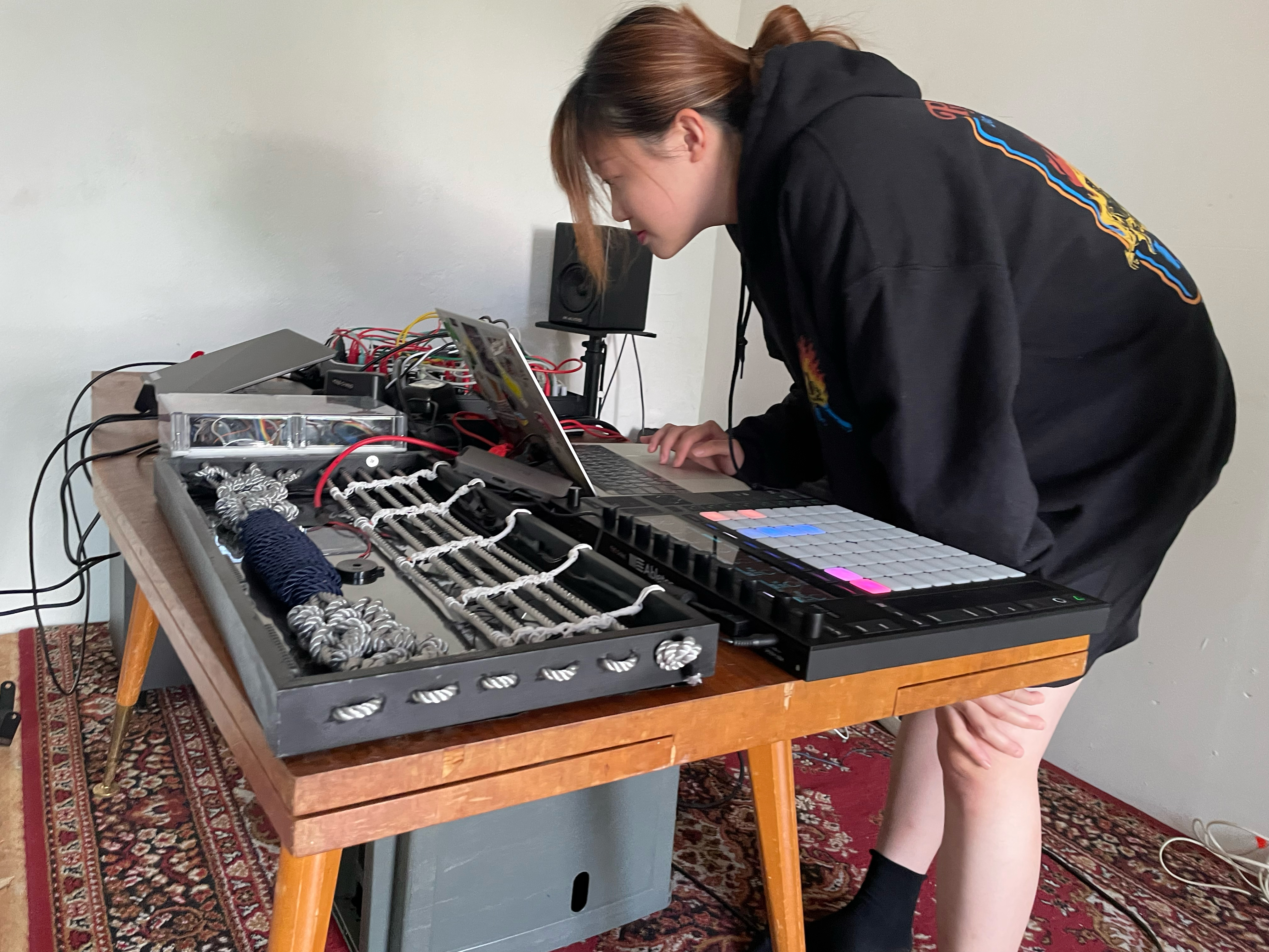 Preparing for a performance in a neighboring country; setting up the work before a show.